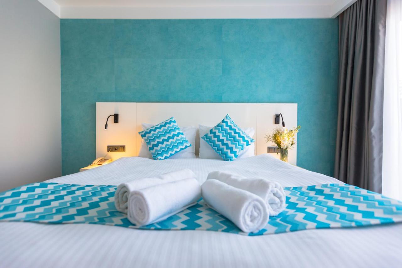 Efe Hotel คูซาดาซี ภายนอก รูปภาพ
